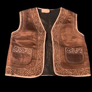 Vintage men’s western leather & silk vest size medium.